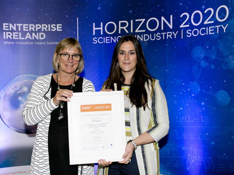 Roisin McCormack, Sales & Marketing Manager at DesignPro accepting the ‘Champions of EU Research’ award from Julie Sinnamon, CEO of Enterprise Ireland (June 2017).